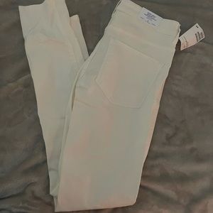 New H&M white skinny jeans